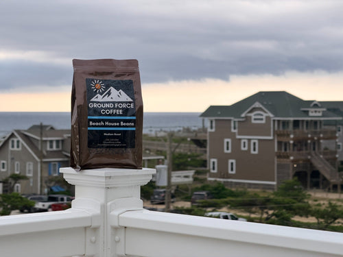 Beach House Beans coffee bag with ocean beach house background